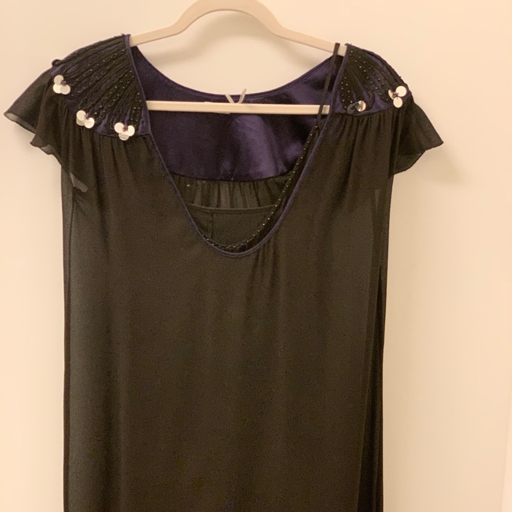 Beautiful dress with silk slip attached.